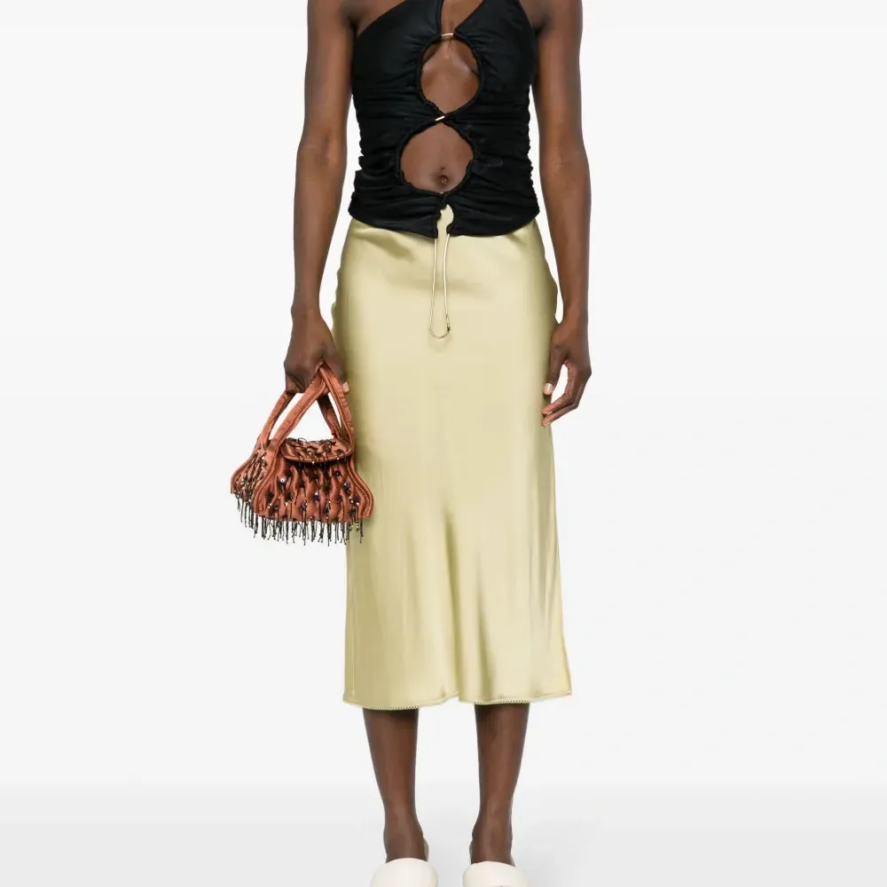 Топ асимметричного кроя с вырезами