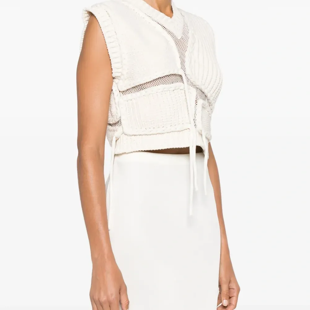 Топ Tortoise без рукавов Топ Tortoise без рукавов