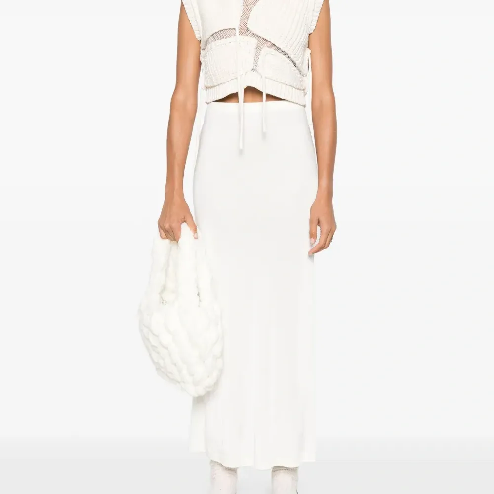 Топ Tortoise без рукавов Топ Tortoise без рукавов