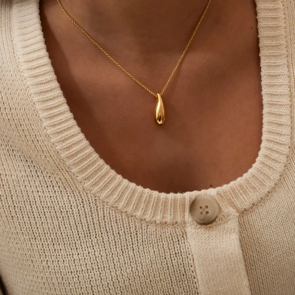 Подвеска из зернистой кожи