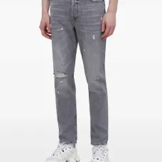 Джинсы с потертостями Джинсы с потертостями