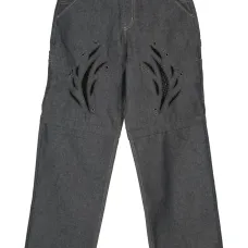 Широкие джинсы с вырезами