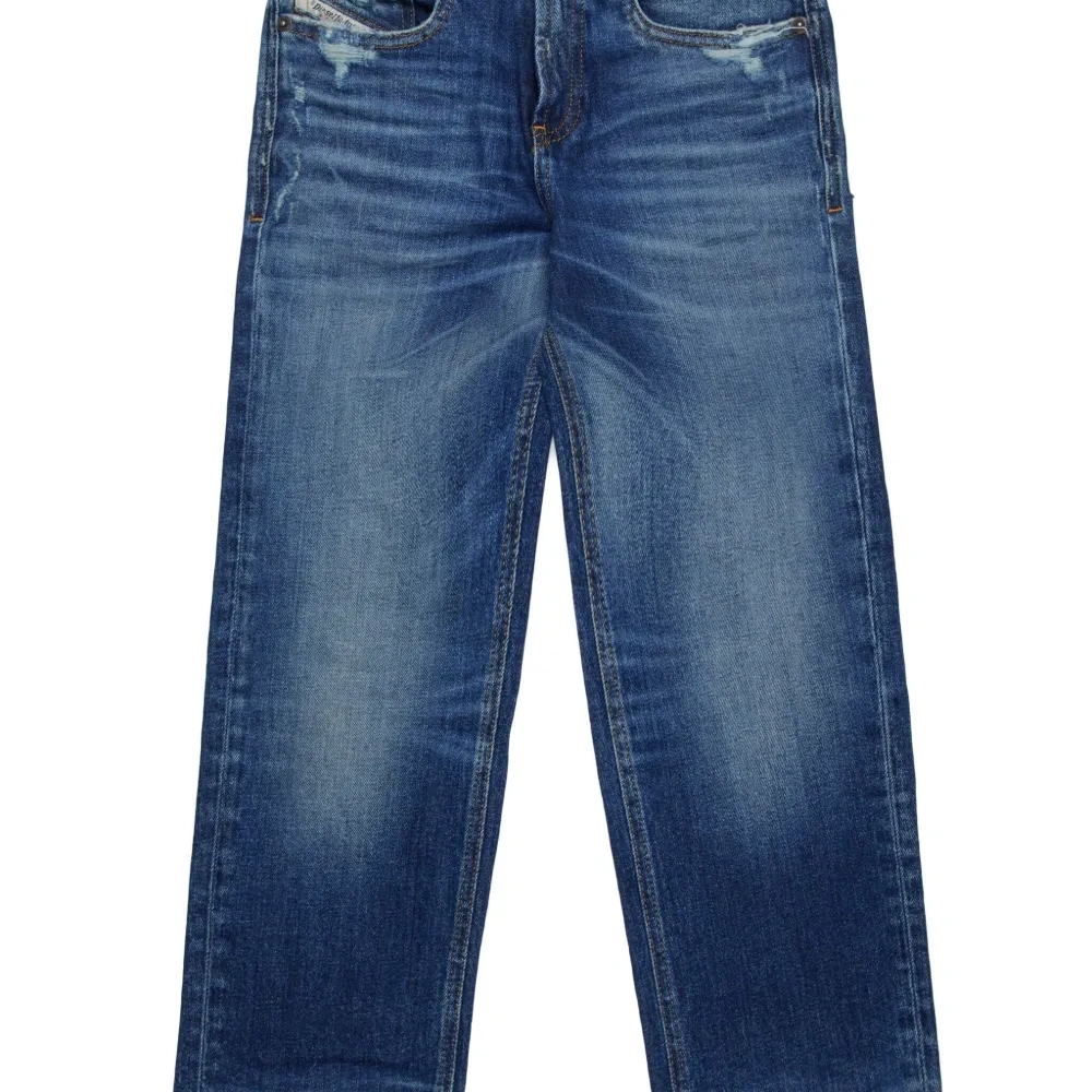 Узкие джинсы средней посадки Узкие джинсы средней посадки