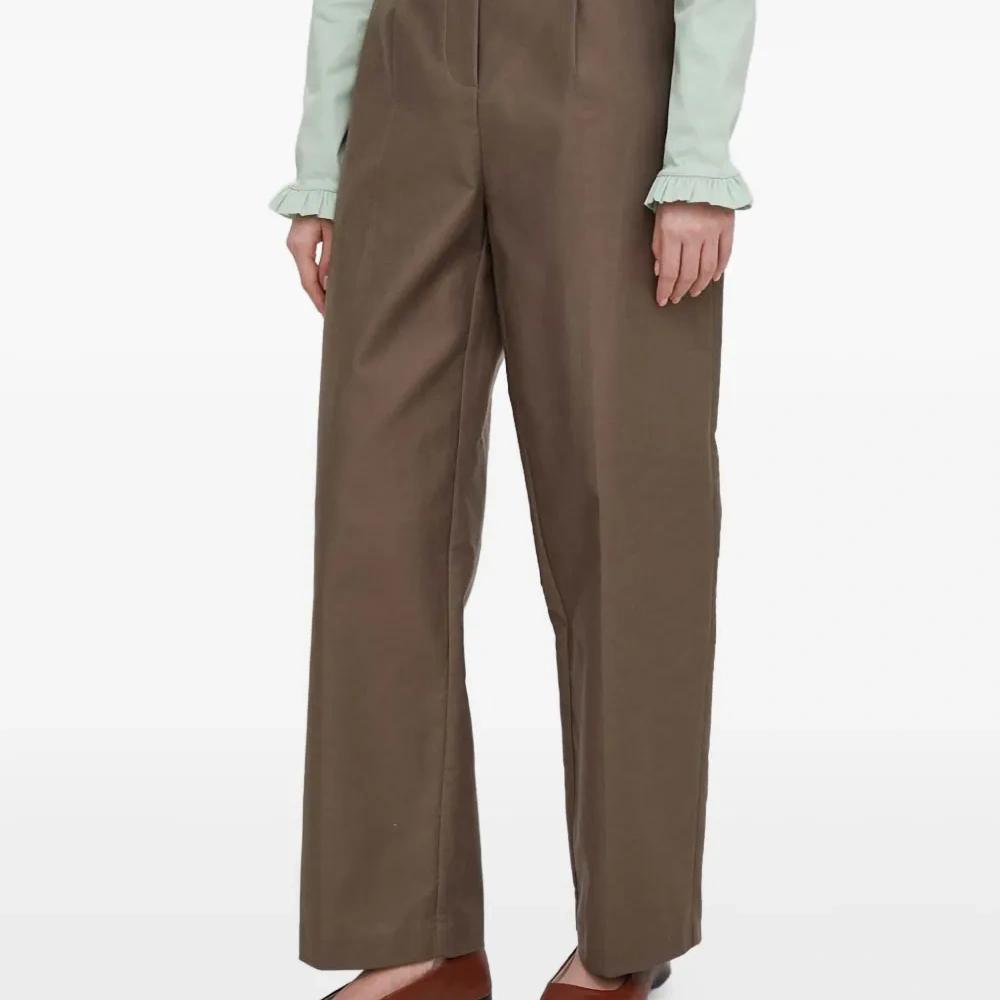 Плиссированные брюки