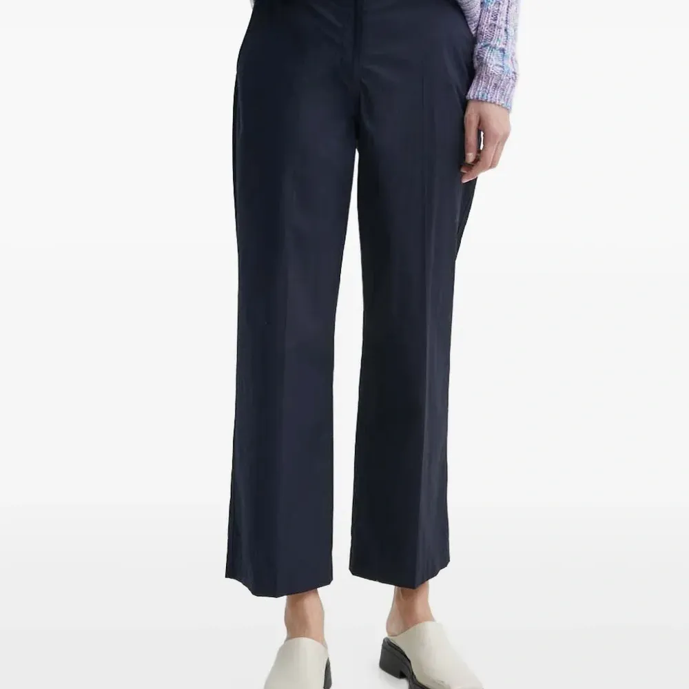 Брюки с застежкой на пуговицу