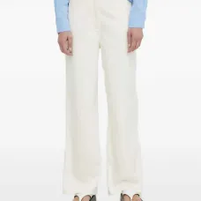 Джинсы с пятью карманами и нашивкой-логотипом