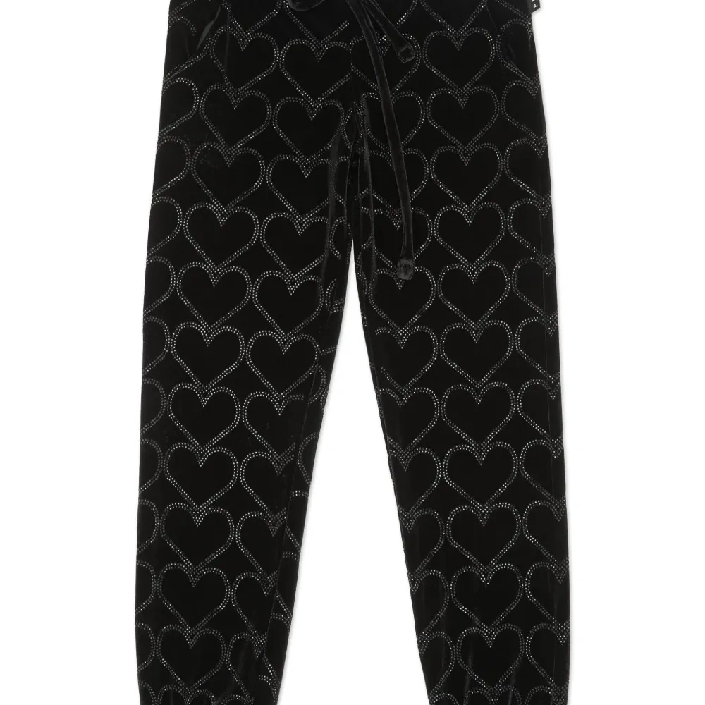 Спортивные брюки с заклепками