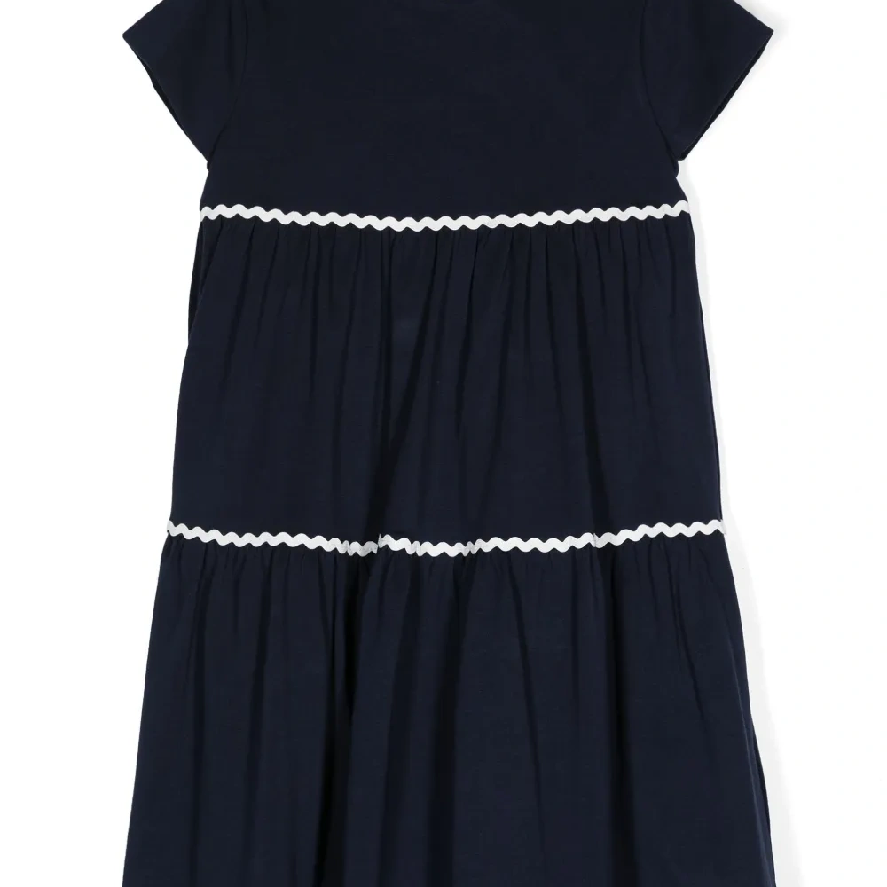 Расклешенное платье с фестонами