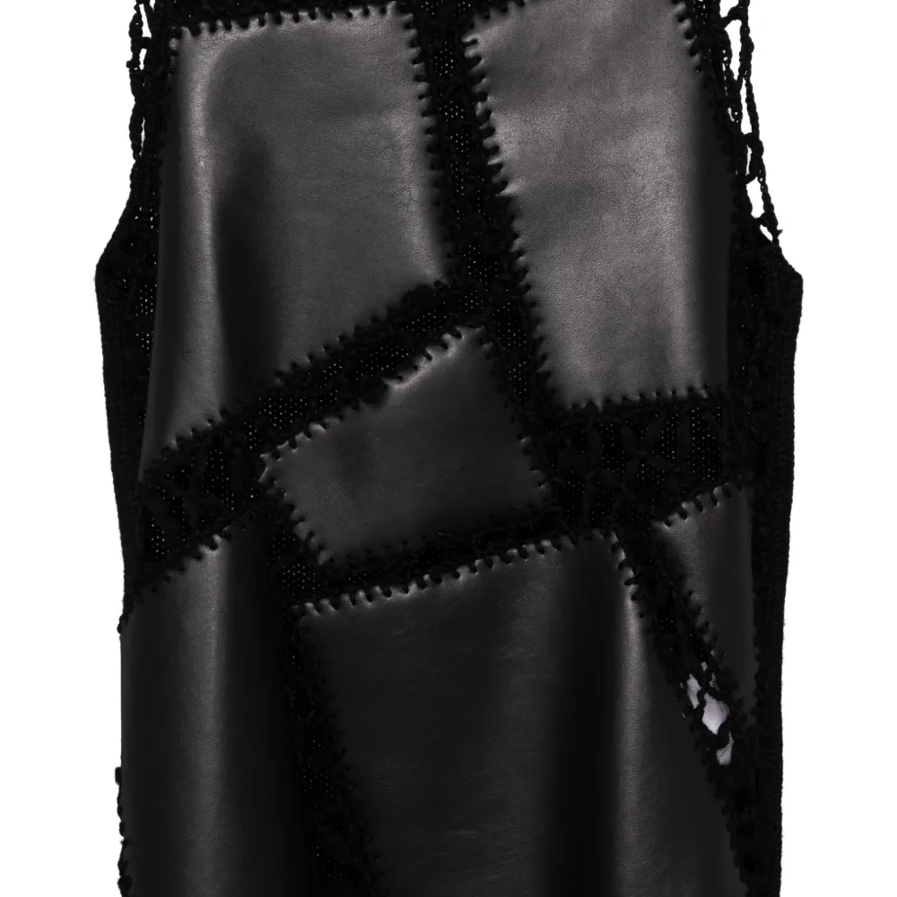 Жилет рыхлой вязки Жилет рыхлой вязки