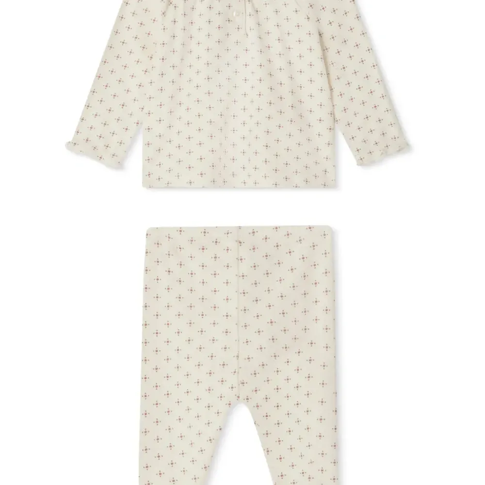 Комплект из топа и брюк с геометричным принтом