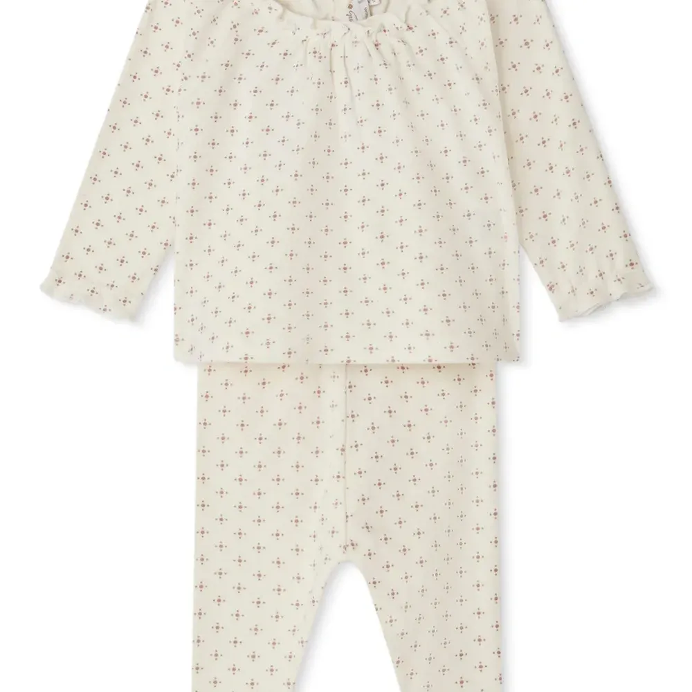 Комплект из топа и брюк с геометричным принтом