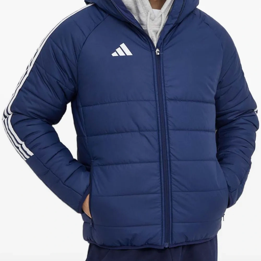 Стеганая куртка с тремя полосками Стеганая куртка с тремя полосками