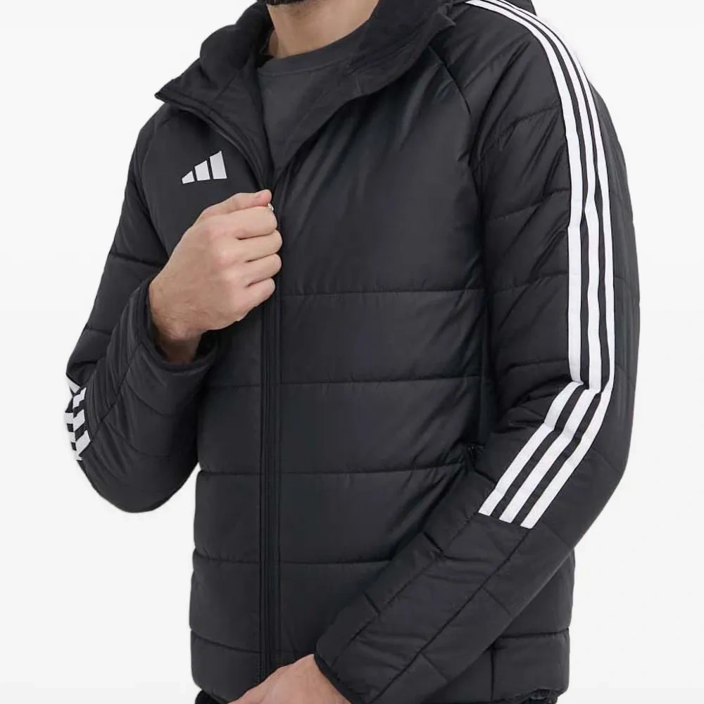 Стеганая куртка с тремя полосками Стеганая куртка с тремя полосками