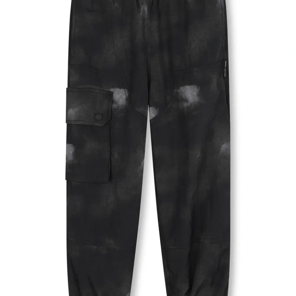 Брюки с эффектом потертости