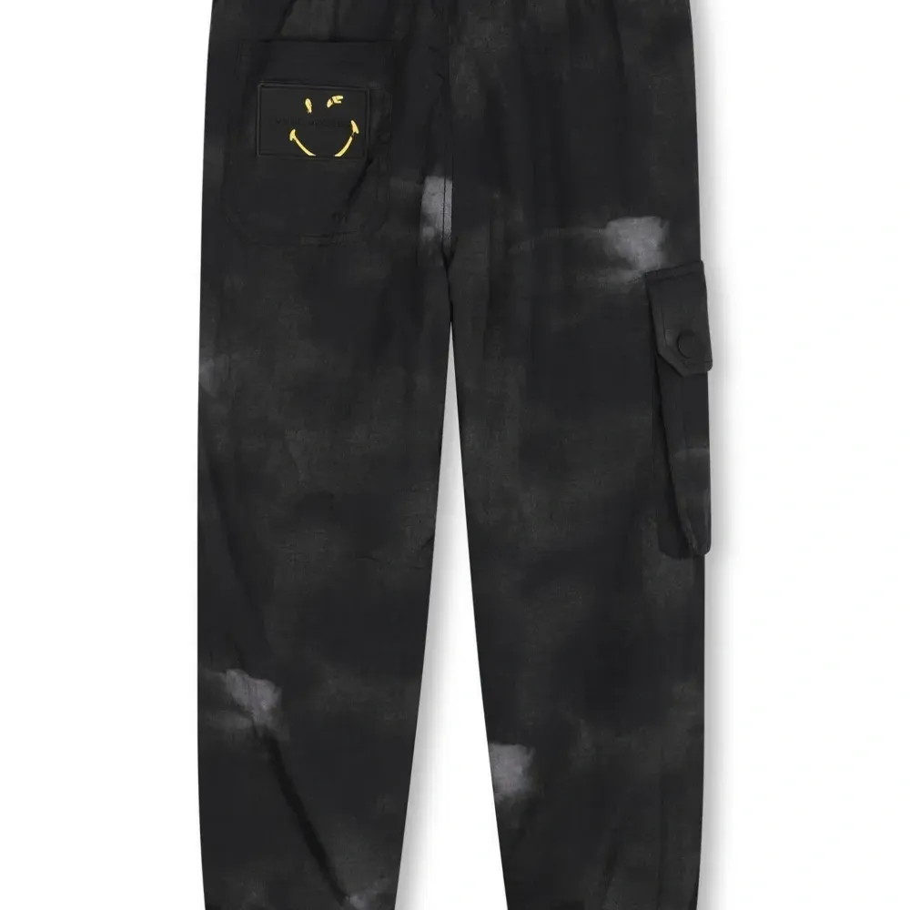 Брюки с эффектом потертости