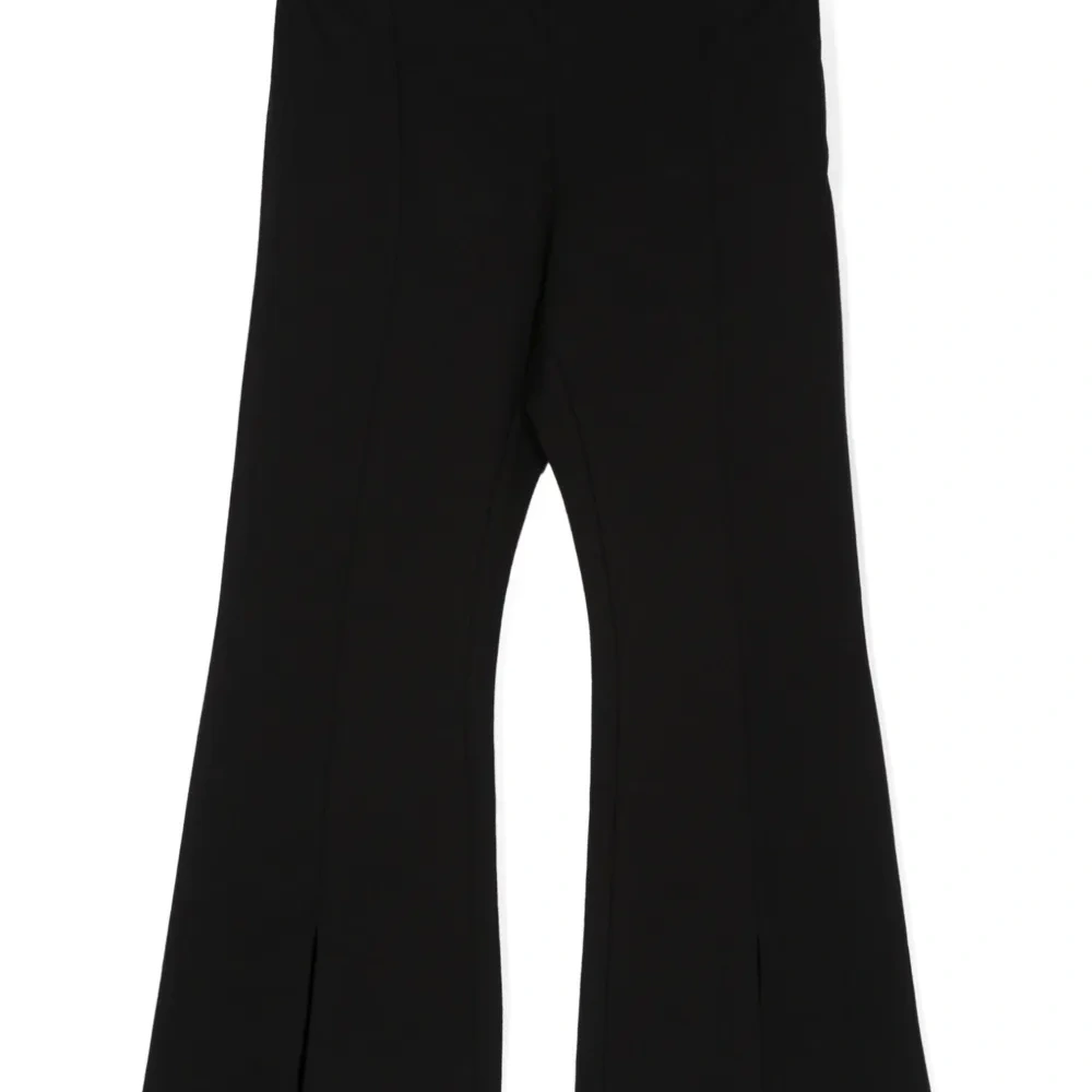 Расклешенные брюки с разрезами