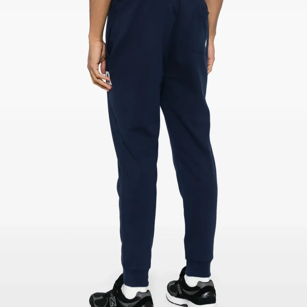 Спортивные брюки с вышитым логотипом