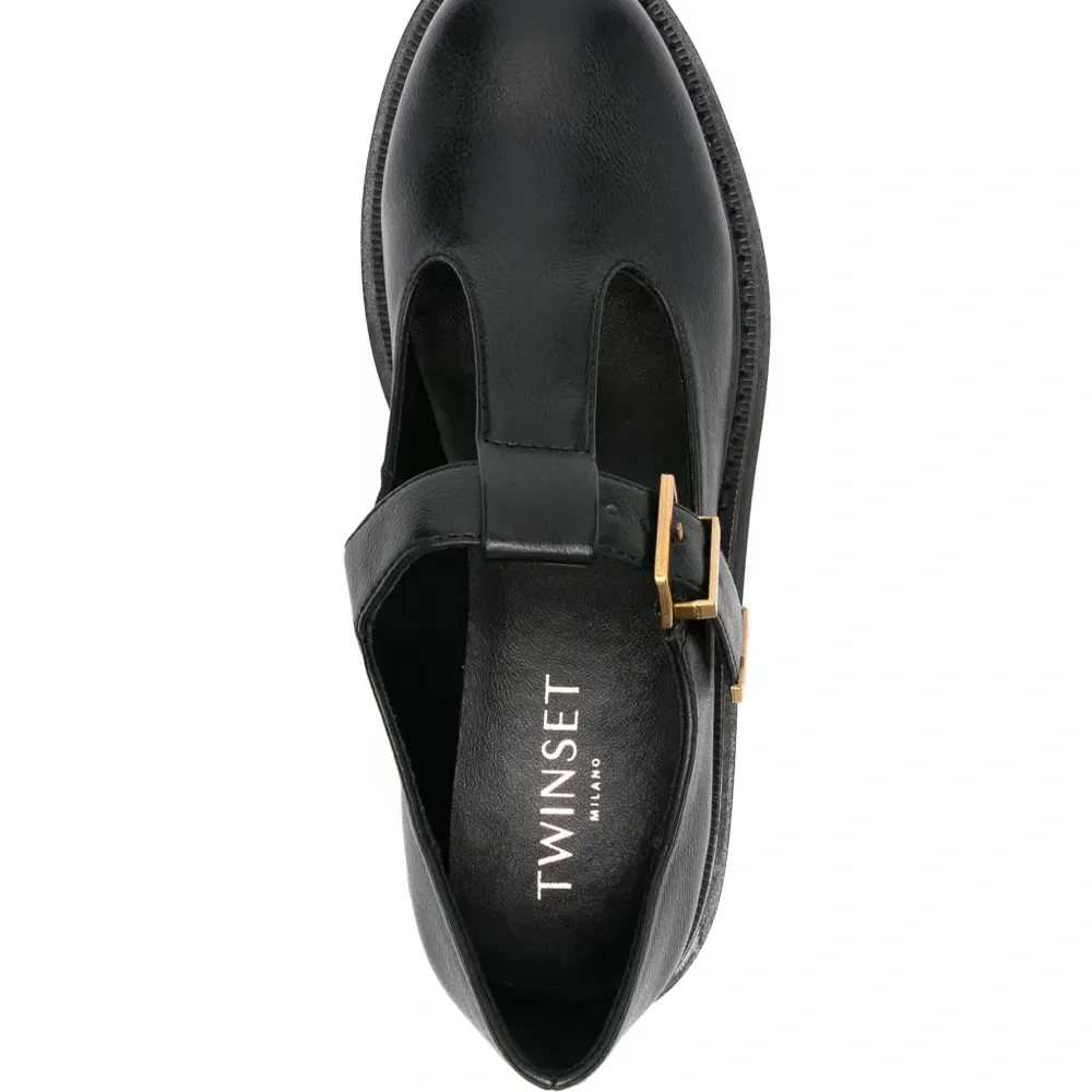 Лоферы с пряжкой Double T