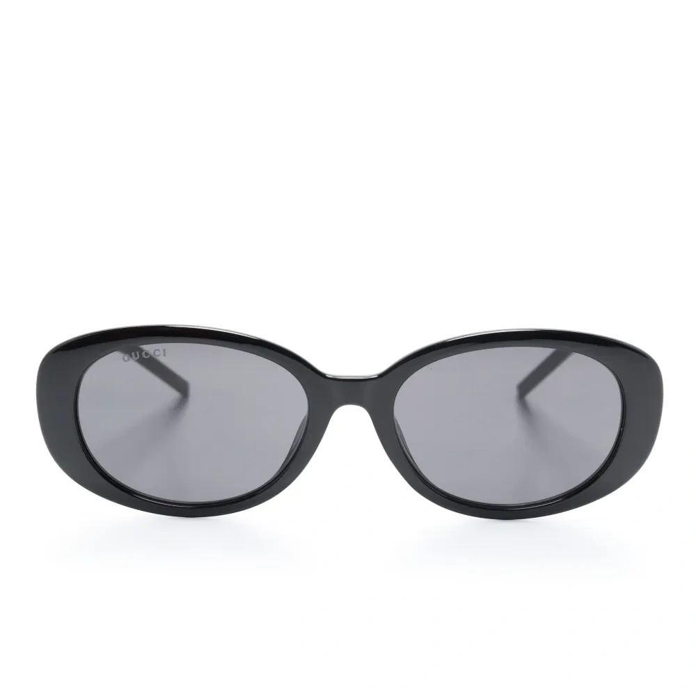 Солнцезащитные очки в овальной оправе