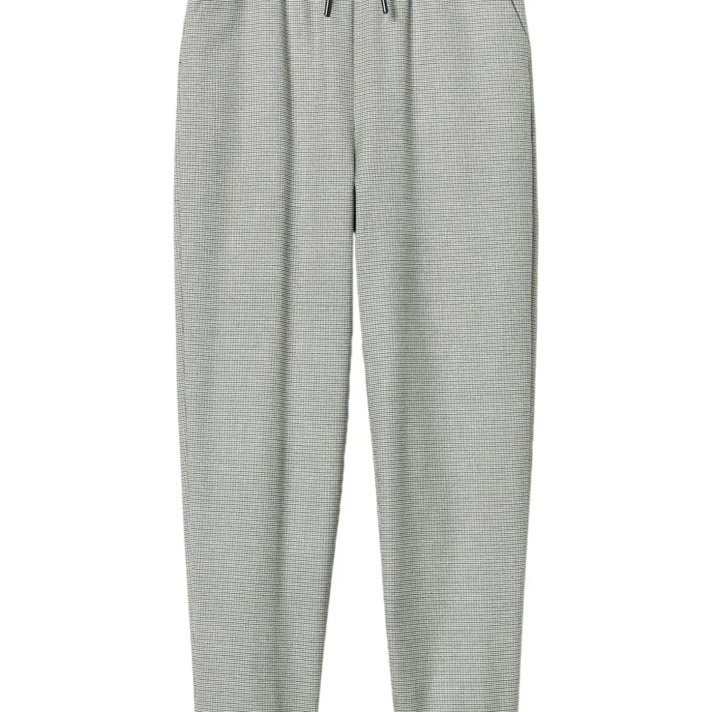 Спортивные брюки в ломаную клетку