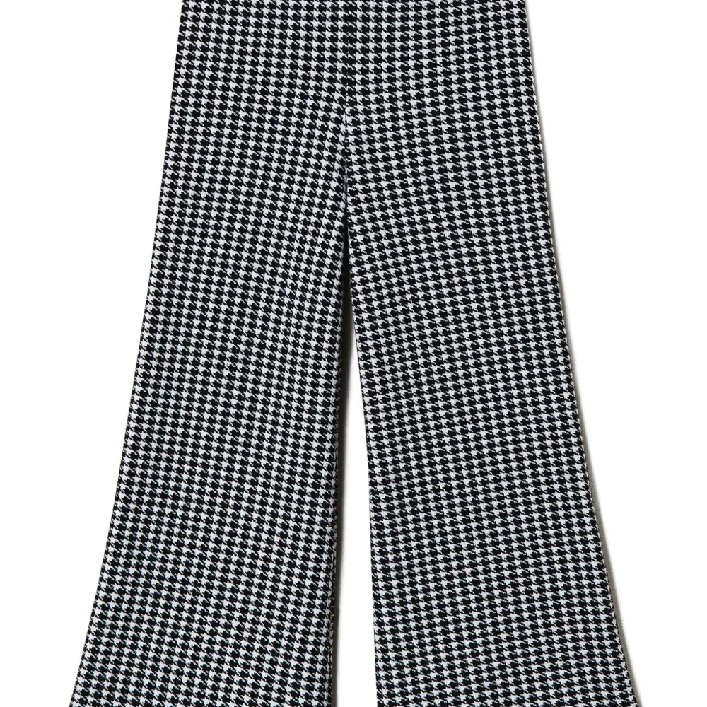 Жаккардовые брюки в ломаную клетку