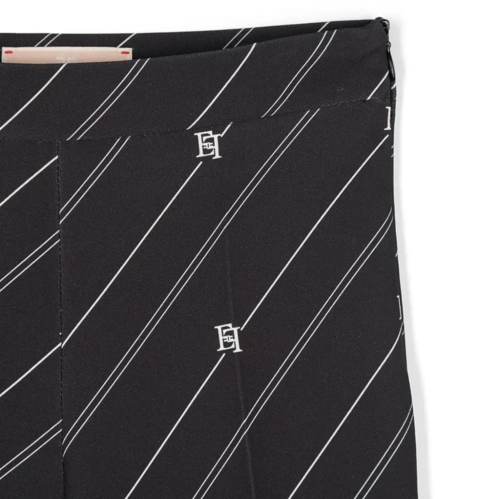 Брюки в полоску