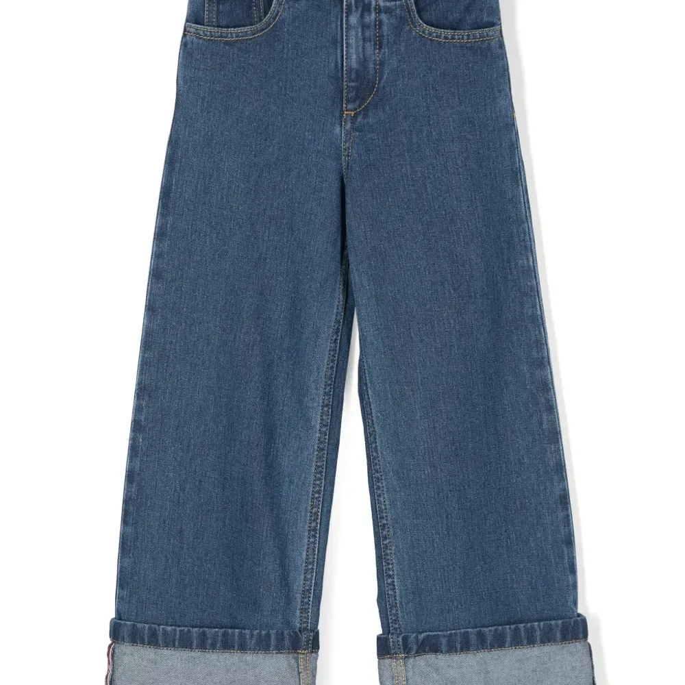 Джинсы с подворотами