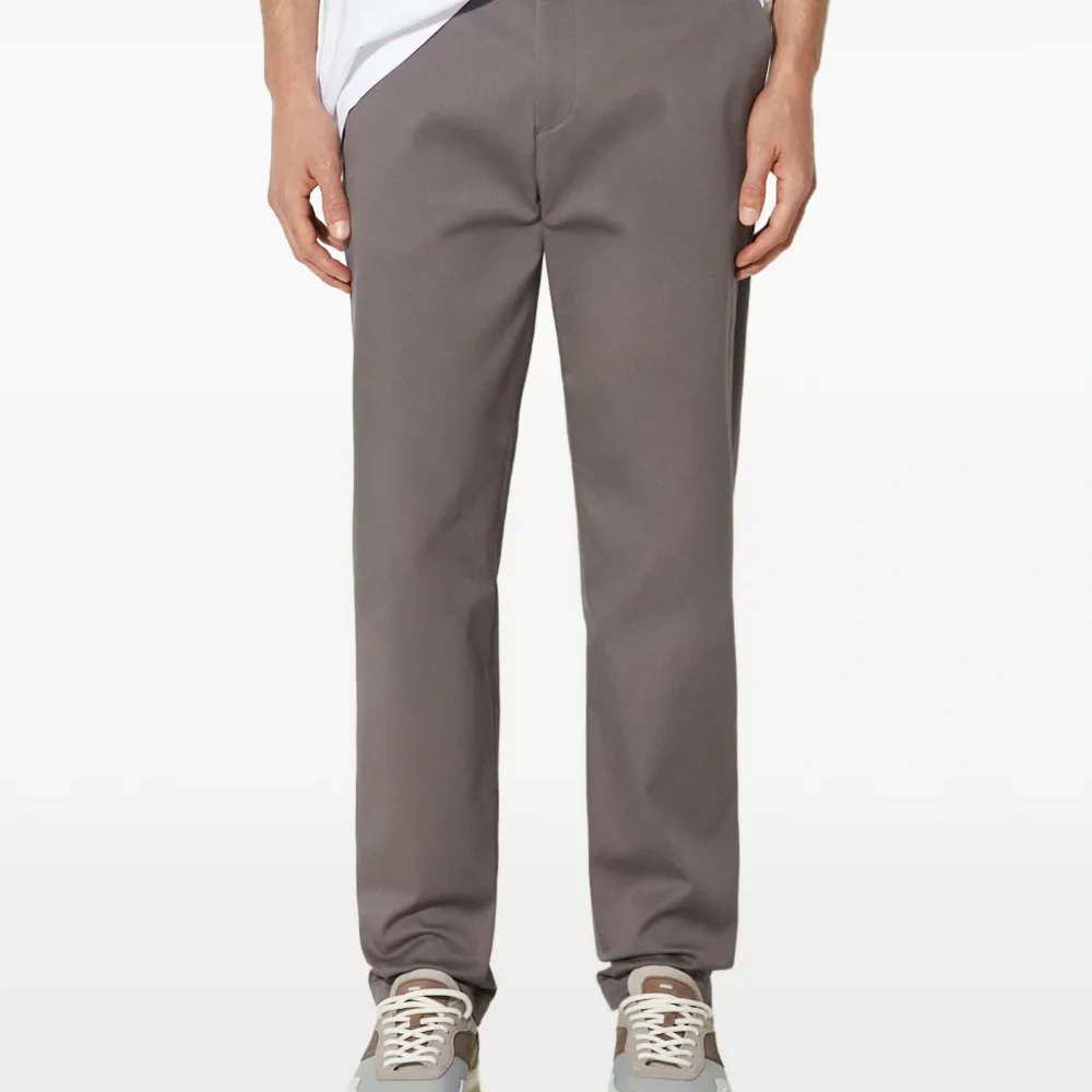 Брюки с карманами на пуговицах