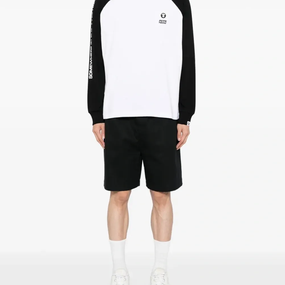 футболка с рукавами реглан и логотипом