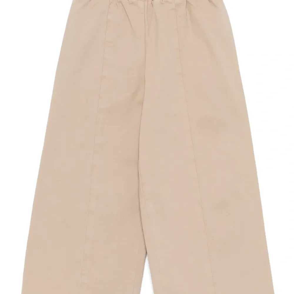 Габардиновые брюки широкого кроя