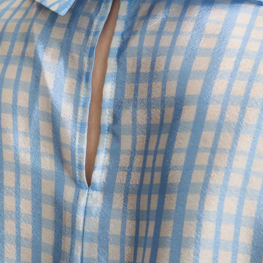 Блузка в клетку