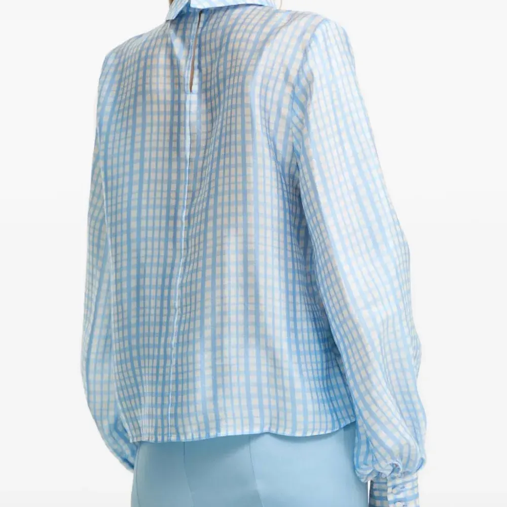 Блузка в клетку