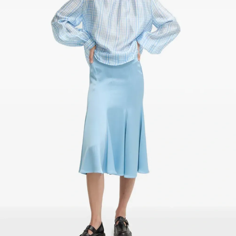 Блузка в клетку