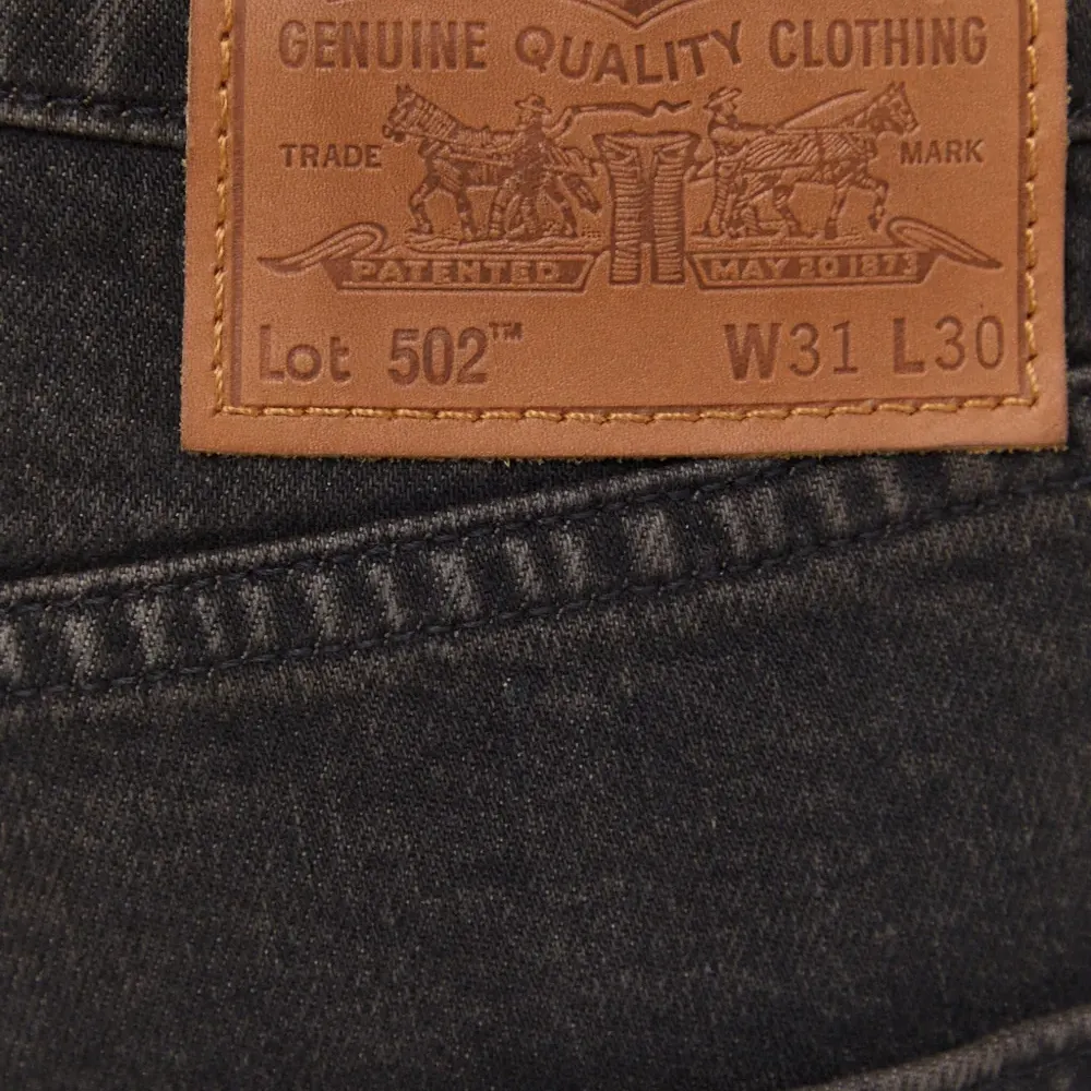 Джинсы 502™ Taper