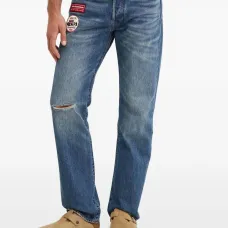 Джинсы из состаренного денима