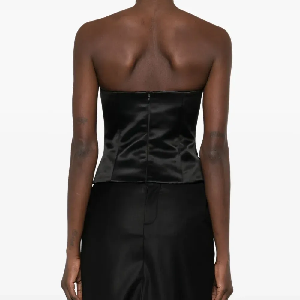 Топ-корсет Onassis из коллаборации с Gieves & Hawkes