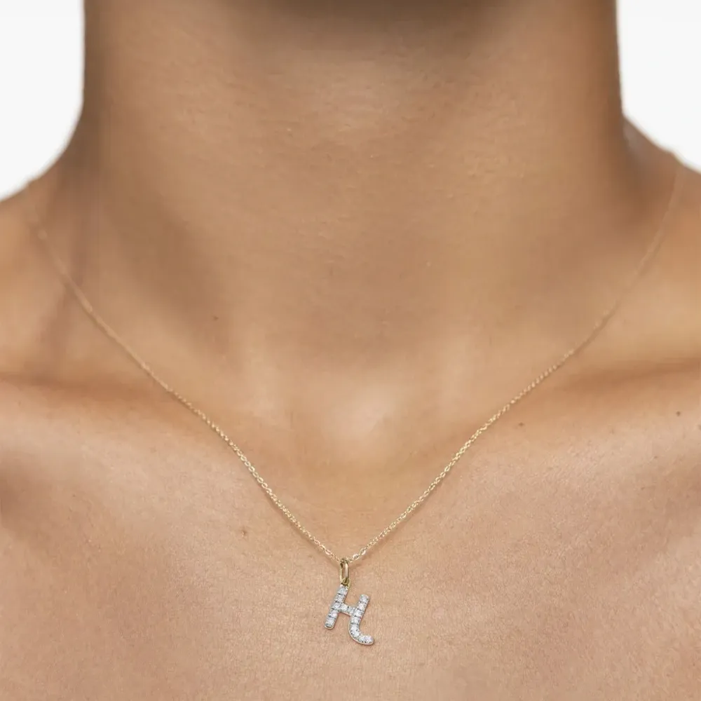 Подвеска H из желтого золота с бриллиантами