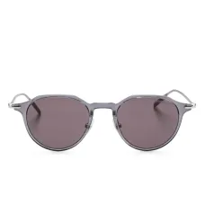 Солнцезащитные очки в круглой оправе