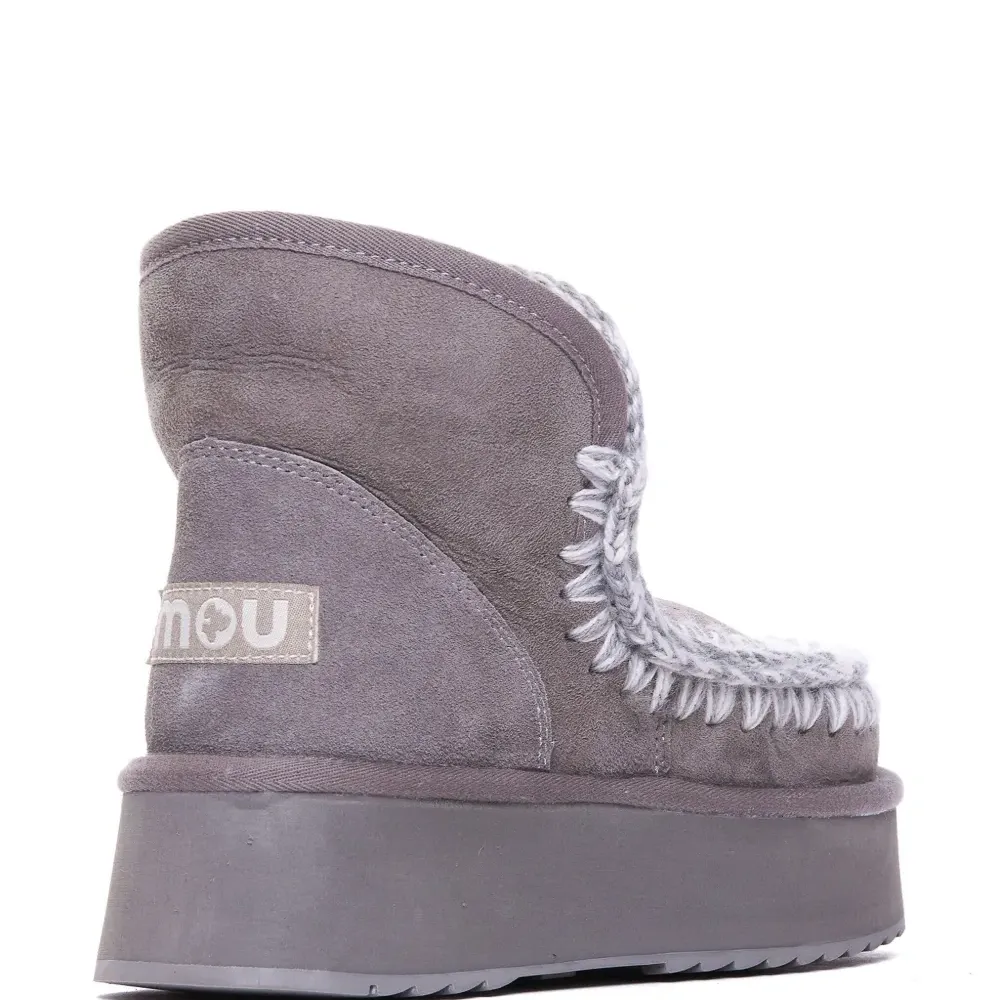 Ботинки с плетеной окантовкой