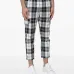 брюки в клетку