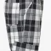 брюки в клетку