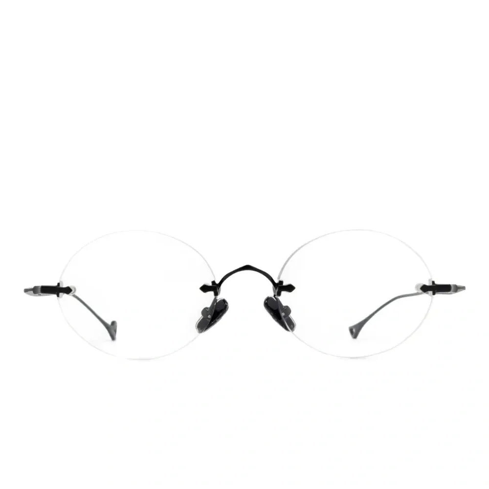 очки в круглой безободковой оправе