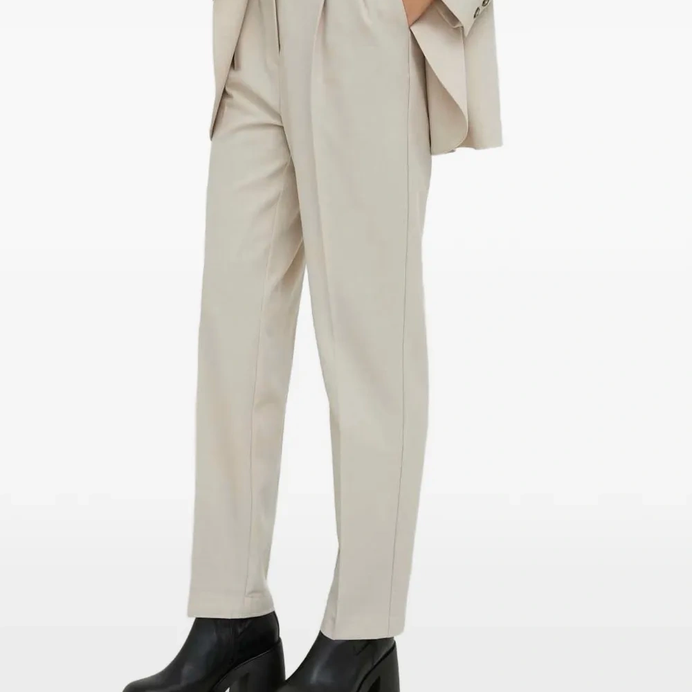 Плиссированные брюки