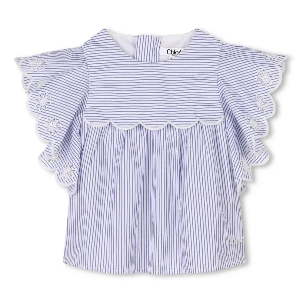 Полосатая блузка с оборками