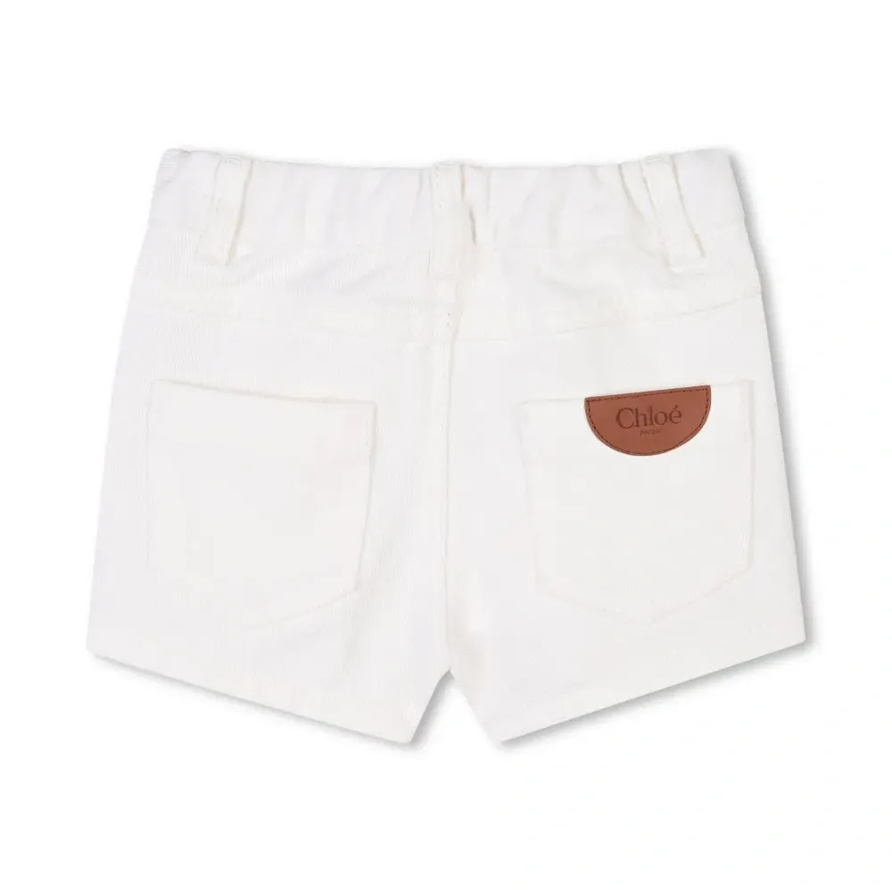 Джинсовые шорты с фестонами