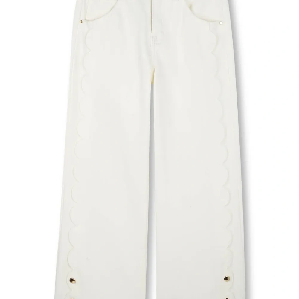 Джинсы с фестонами