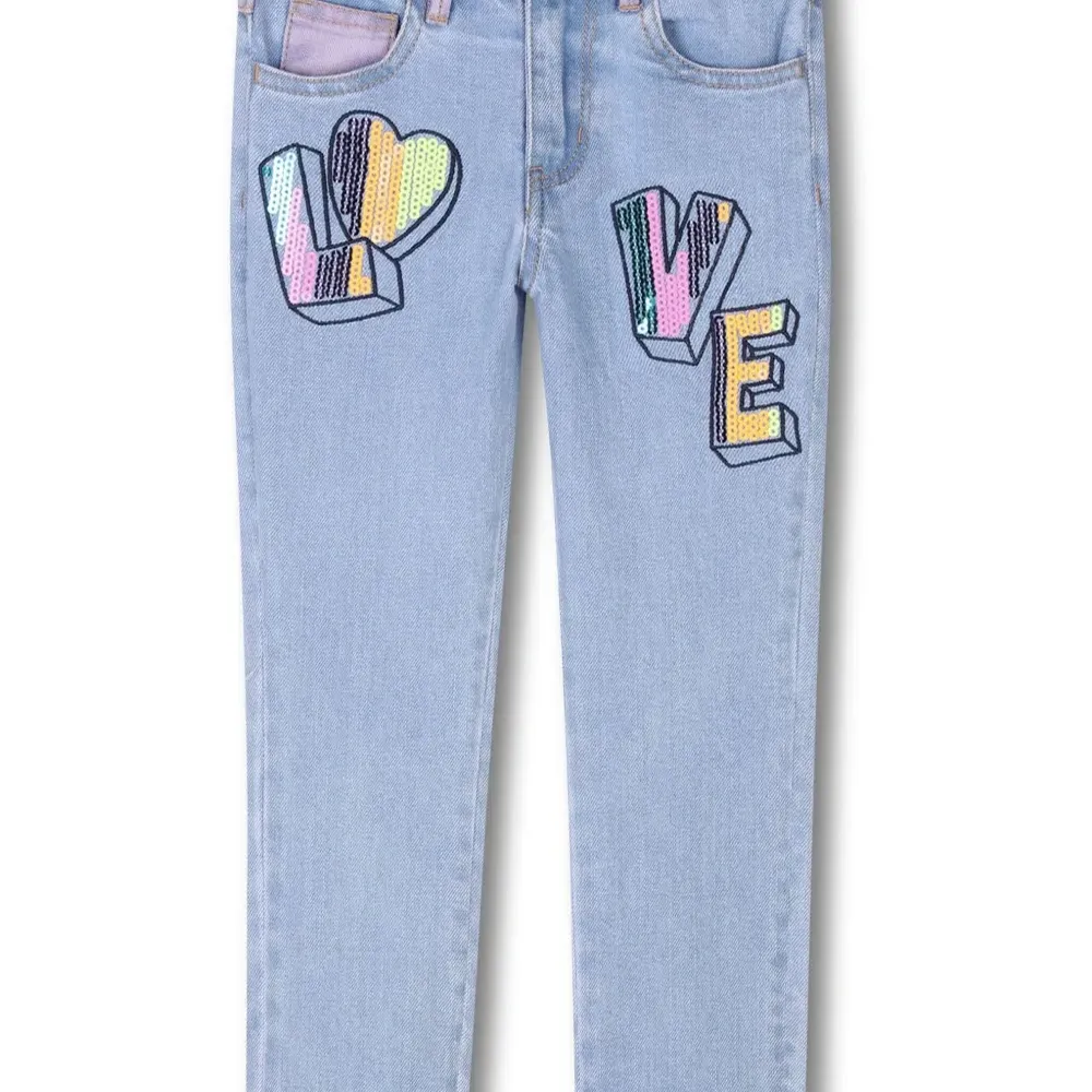 Джинсы с вышивкой