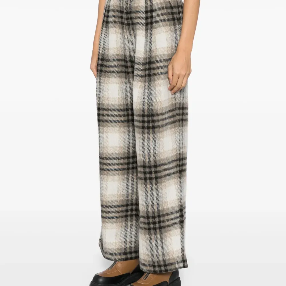 Брюки в клетку