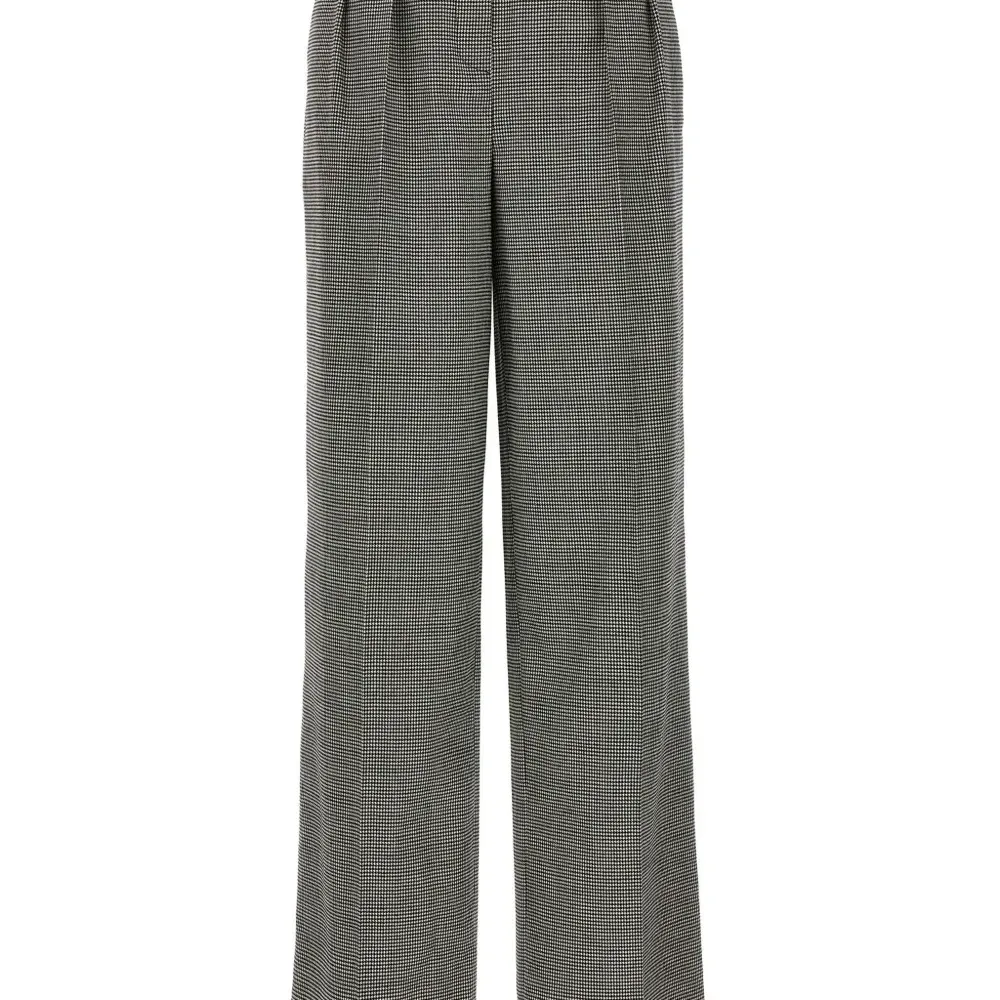 Брюки в ломаную клетку