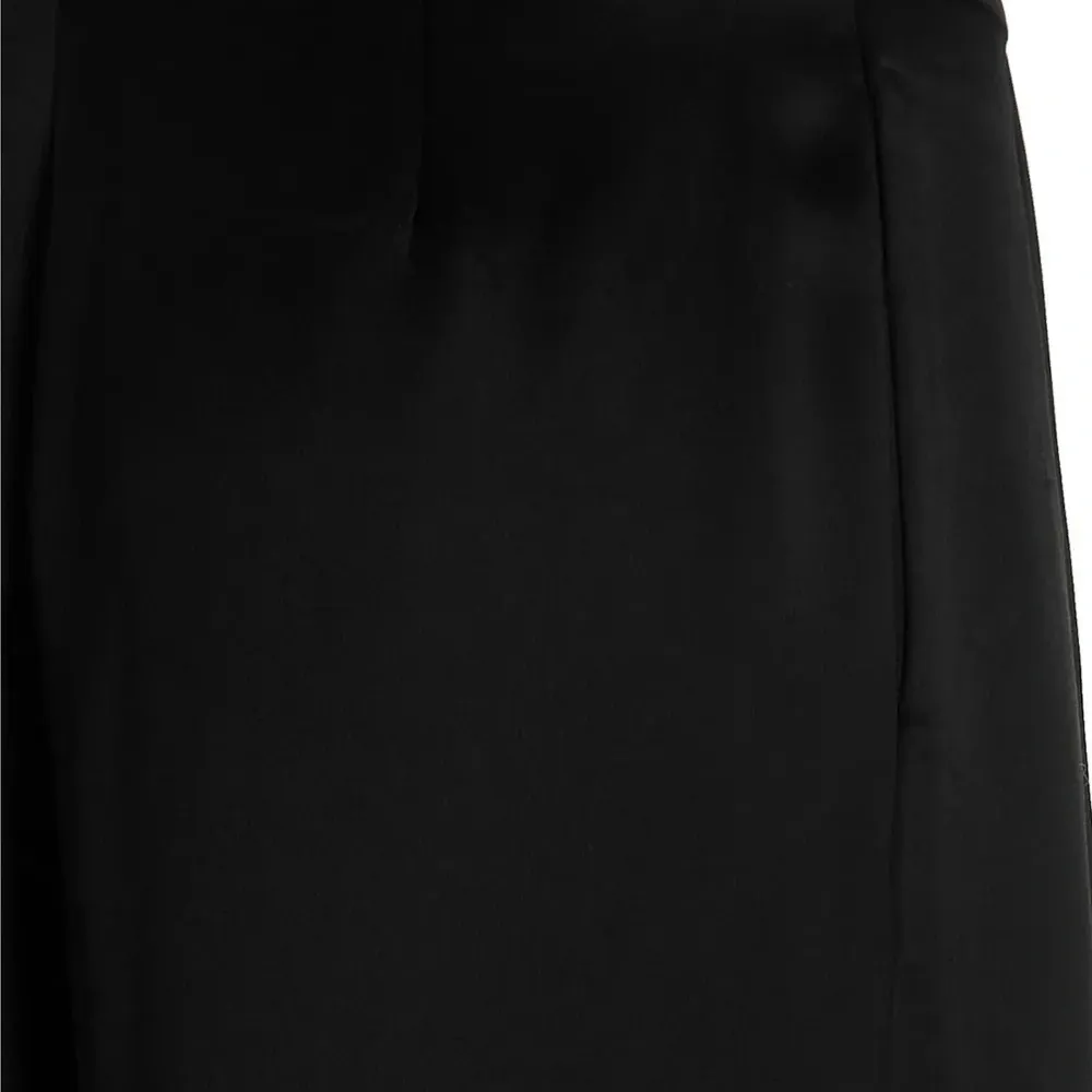 Плиссированные брюки Плиссированные брюки